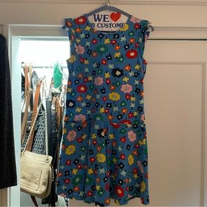 Hanna Andersson 140 (size 10) flower knit dress. Short sleeve w/snap pockets.